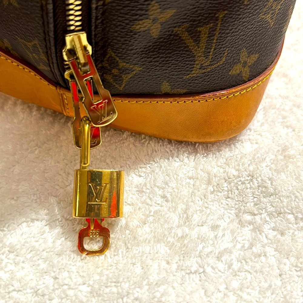 Louis Vuitton Gold Padlock